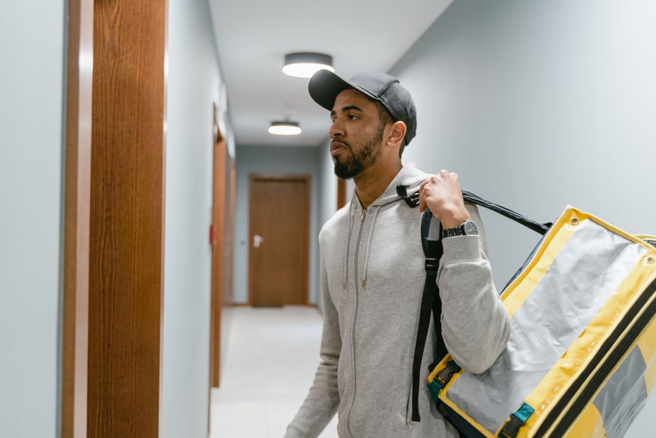 Person recovering and walking in a hospital hallway