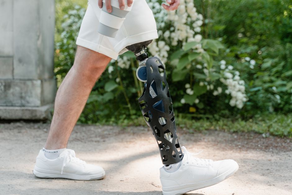 Person walking in a park during recovery from gastric bypass surgery