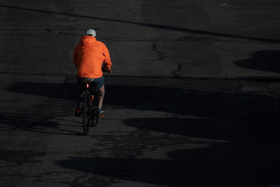 Person cycling outdoors as part of an active healthy lifestyle