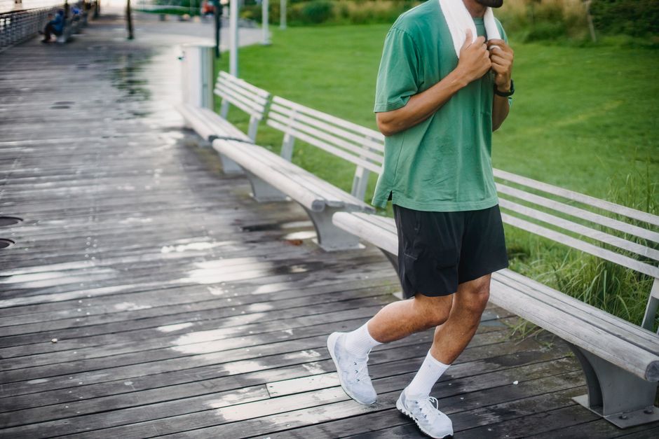 Person jogging outdoors as part of an active healthy lifestyle