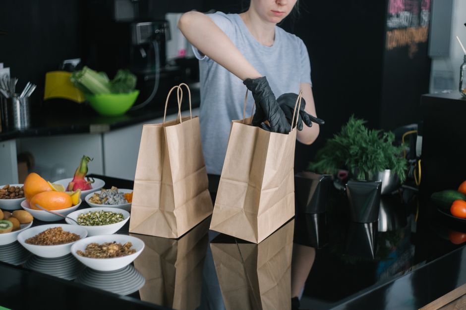 Person preparing healthy food for meal prep after surgery