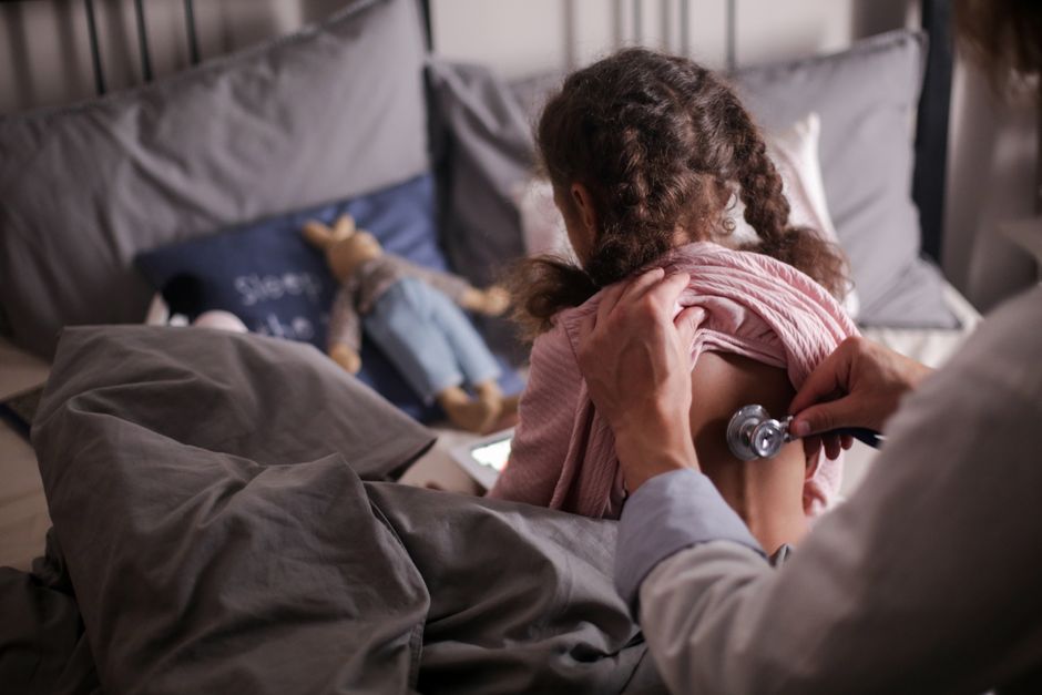 Doctor consulting with a patient about acid reflux symptoms