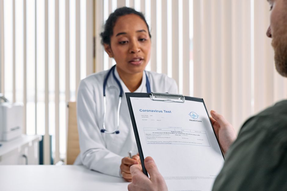 Doctor reviewing diagnostic test results for reflux disease