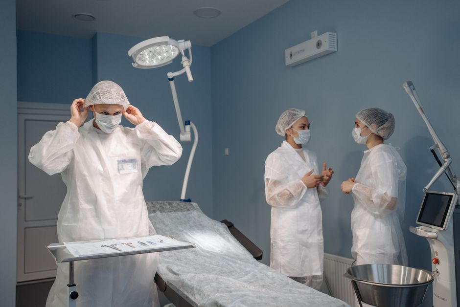 Surgical team preparing for a hernia repair procedure