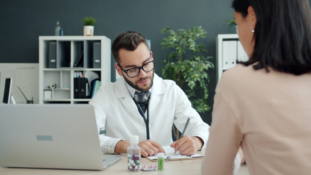 Doctor consulting with patient at Dr. Sami Salem Clinic